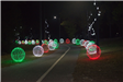 Street Lined with Sphere Shaped Christmas Lights
