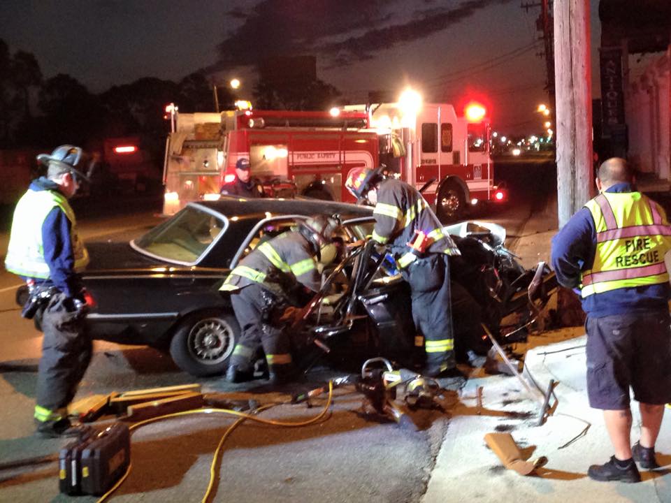 Firefighters Performing an Extraction in a Vehicle