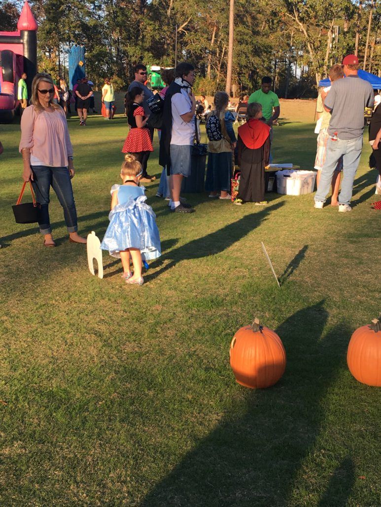 Child playing mini-golf